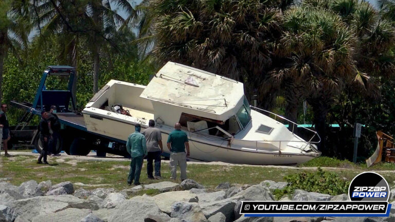 Destroyed Boat on Tow Truck at Haulover Inlet