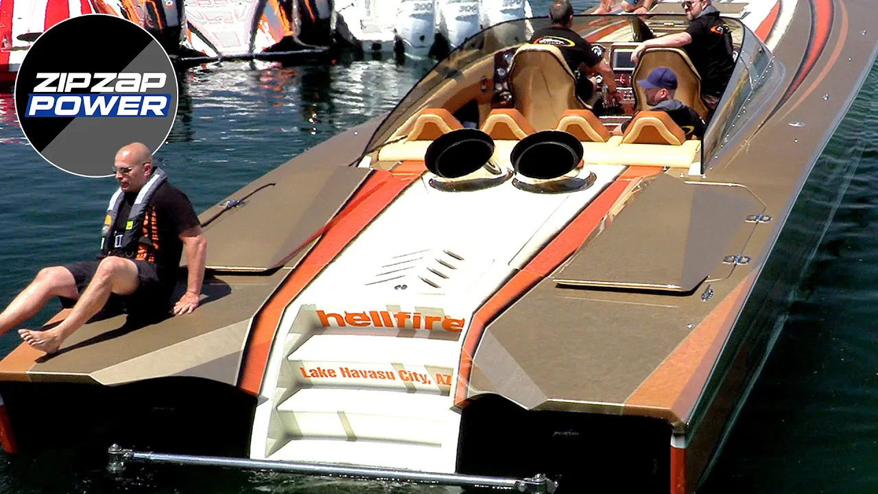 Man sitting on the back of a Skater 46 Twin Turbine named Hellfire